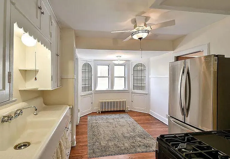 Kitchen with built-ins and newer appliances