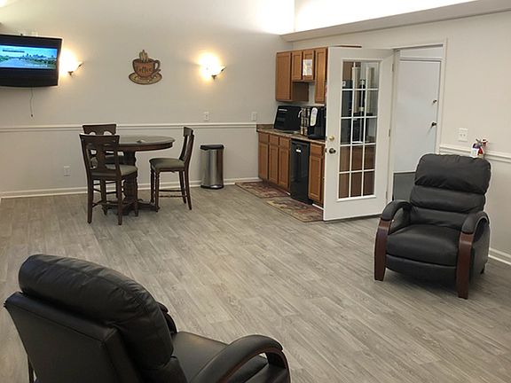 SITTING ROOM WITH COFFEE BAR