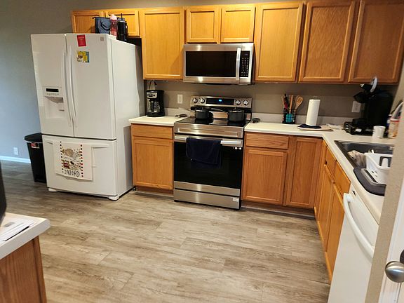 Large Kitchen with hardwood floor and plenty of storage
