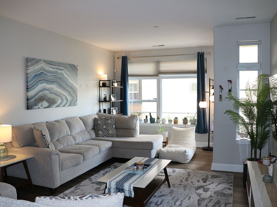 Sunlit living room made for relaxing and unwinding in style
