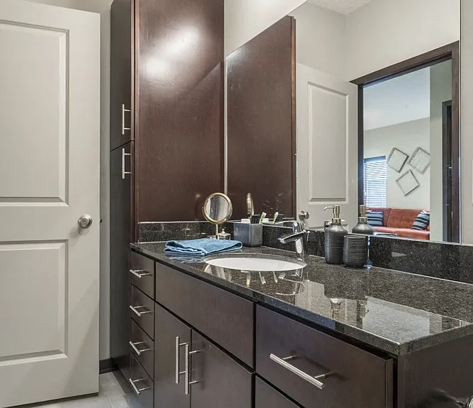 Our bathrooms include spacious vanities with ample storage, perfect for keeping your essentials organized and ready to use.