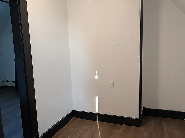 Smaller bonus room facing the master bedroom.