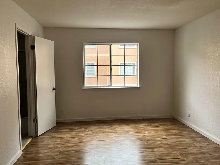 Bedroom with clean flooring