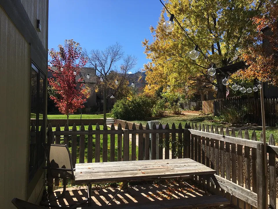 Patio next to community green space.