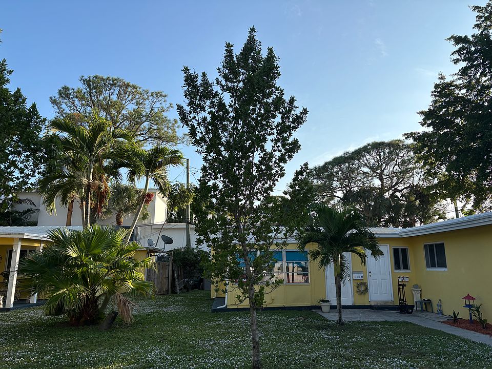 Two private front entrance, one into the two-bedroom unit foyer (left); one into the attached studio unit