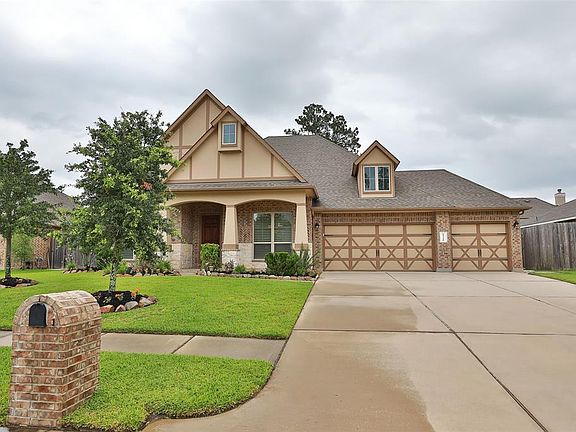Brick exterior on all 4 sides enhanced with limestone. Triple wide driveway!