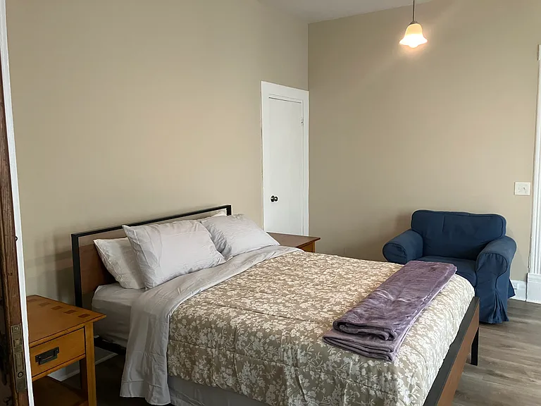 Large, fully furnished second bedroom with a new queen-size bed with a hybrid mattress
