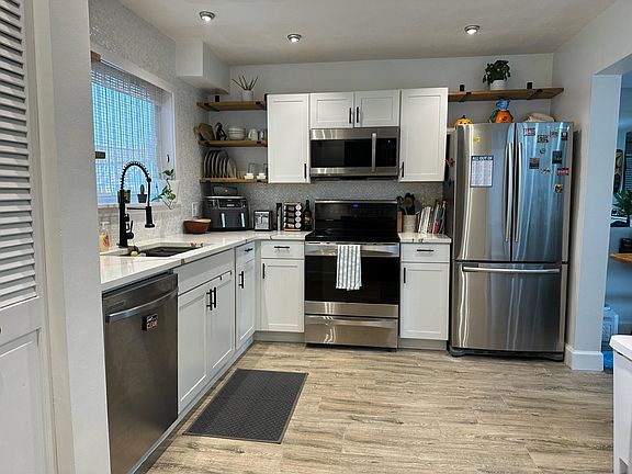 Kitchen with stainless steel appliances