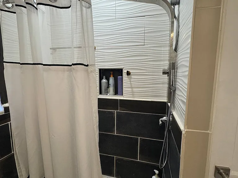 Each Bedroom has a designated Bathroom; Downstairs walk-in shower for Downstairs Guest Room