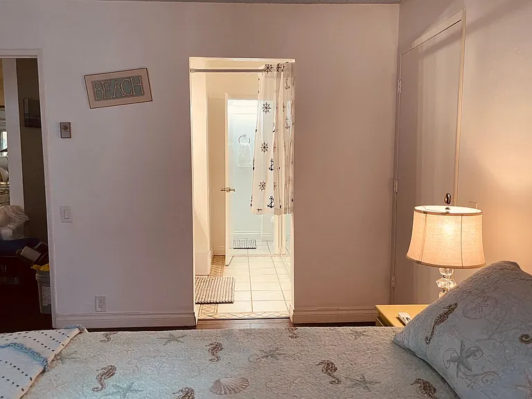 First bedroom suite with en suite bathroom