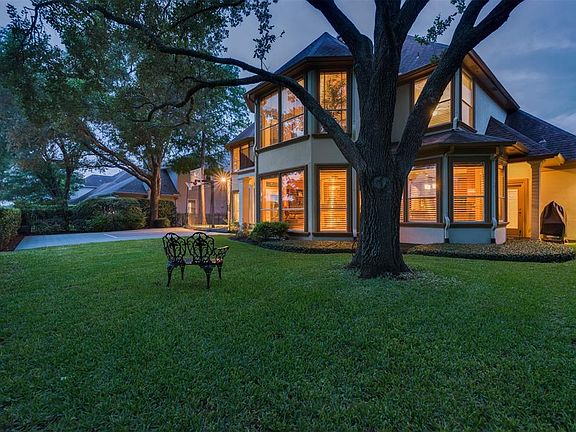 Beautifully maintained yard affords privacy and frequent wild life sightings.