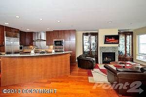 Fireplace, kitchen & breakfast bar