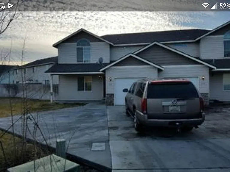 Plenty of parking with front yard as well