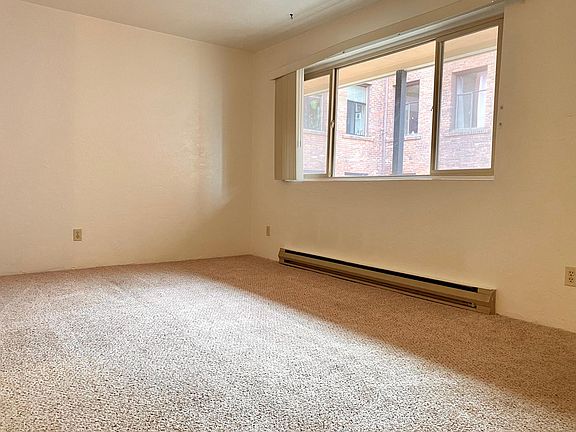 Living Room with vertical blinds