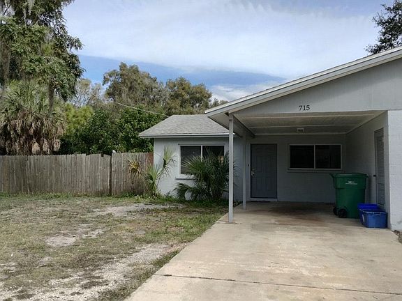 Front with Carport 3