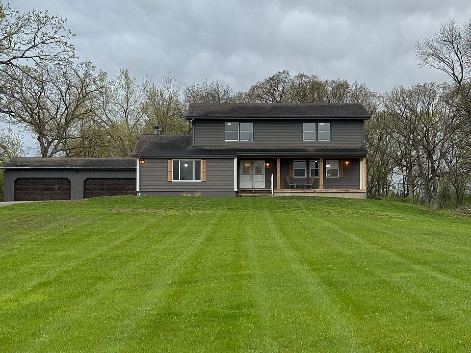 Front with 4 car garage