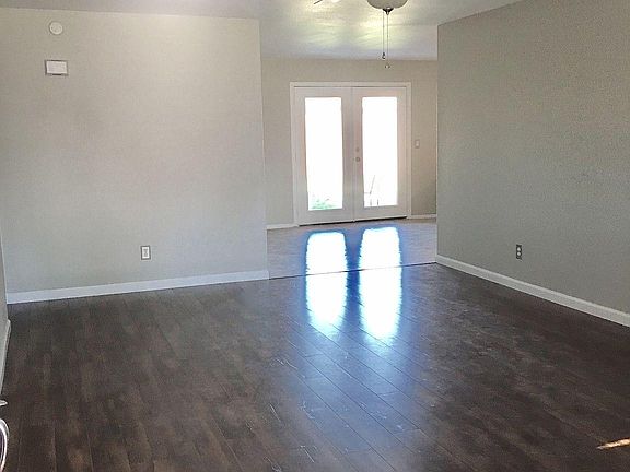 Living Room opens to Dining Room