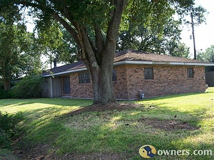 HOME SITS ON 2 LOTS WITH MATURE TREES