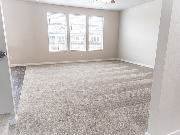 Living room has room for all of your furniture and TV.