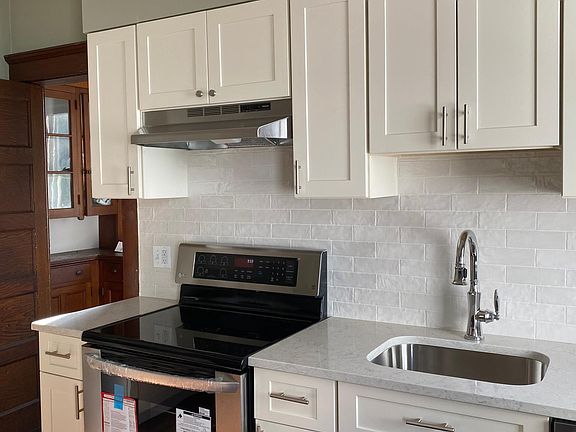 Brand new kitchen with stainless steel appliances