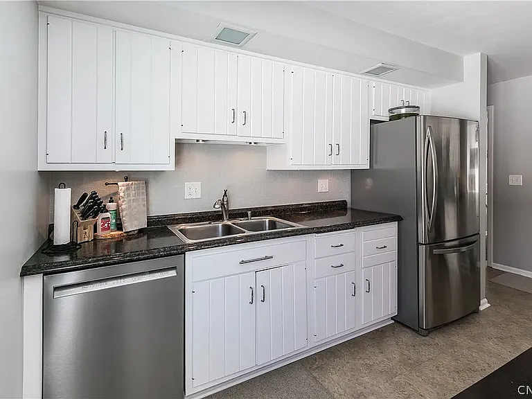 Kitchen Sink, dish washer and Fridge
