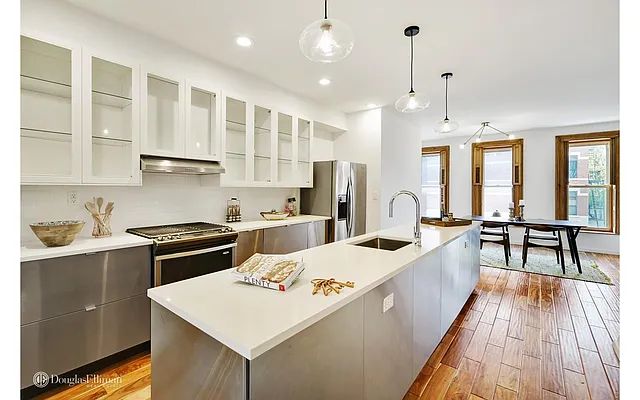 Sold by Douglas Elliman | media 13