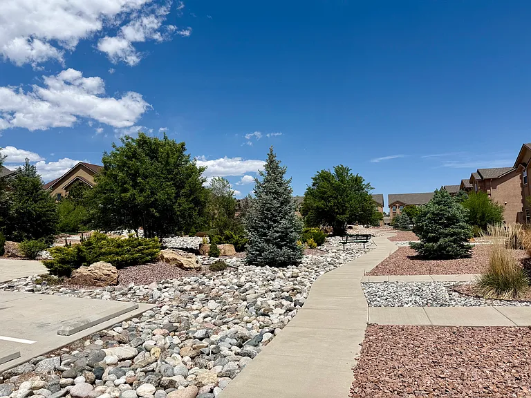 Quiet walkways and mature landscaping right outside your door.
