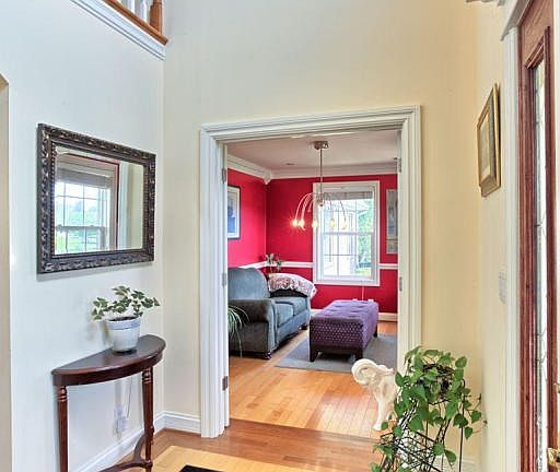 Balcony overlooks 2 story foyer