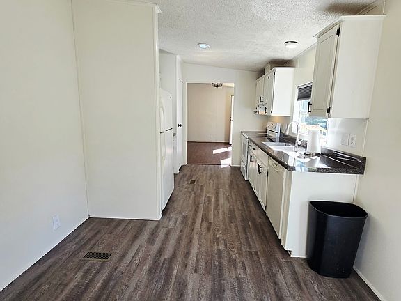Kitchen with eat in area.