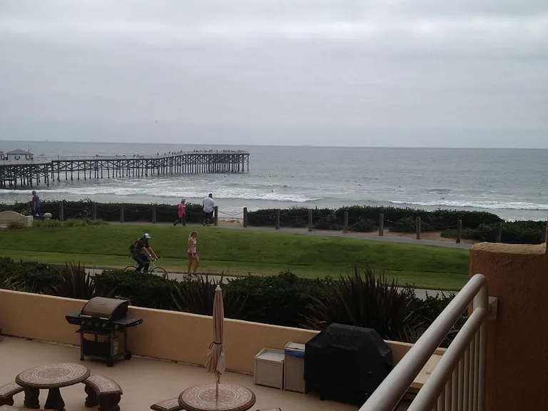 One of two common areas and view from second balcony over courtyard! (has a gas grill!)