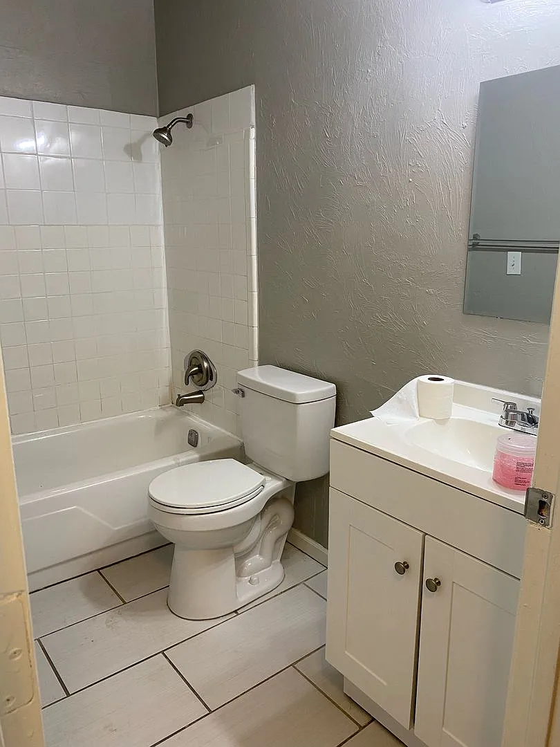 4-Bed, 2-Bath Beauty with Tile Showers & Fenced Yard! — Photo 4