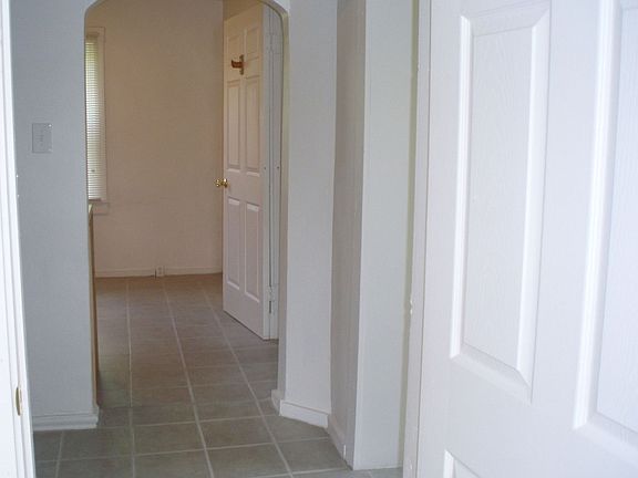 View from First Floor Bedroom through Back Foyer into Kitchen