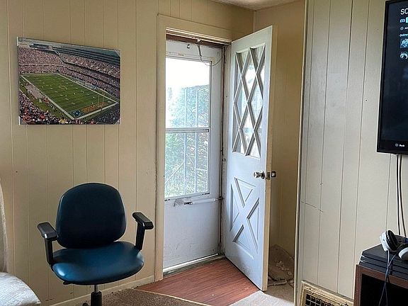 FIRST FLOOR:  Front door, small foyer and portion of living room.