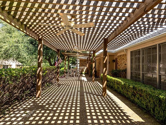 three ceiling fans in pergola