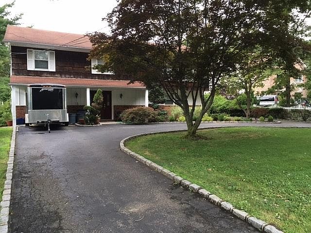 Front Circular Drive Way & trailer in front of garage