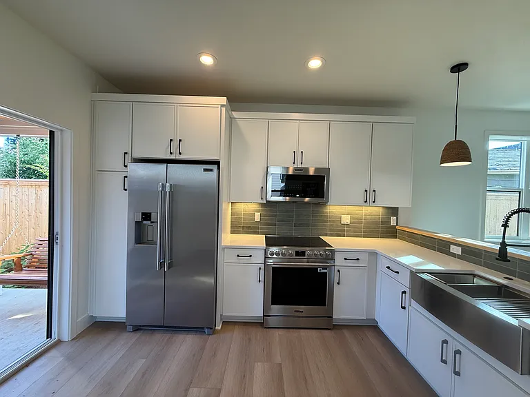 Kitchen, with access to the backyard.