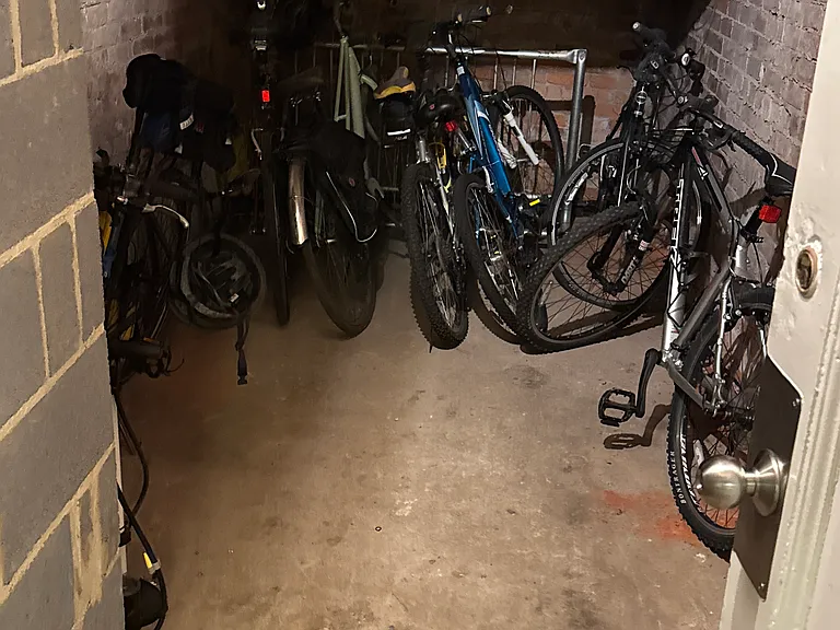 bike storage room (basement-level next to laundry room)