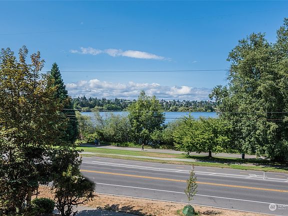 Enjoy sweeping views of the Lake and beyond from most rooms of the home.>