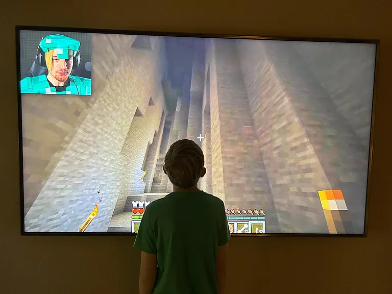 My son watching a minecraft video on youtube.