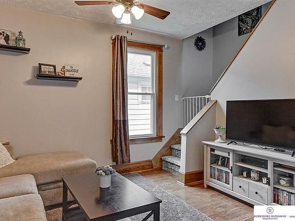 Living room with stairs to the upper floor