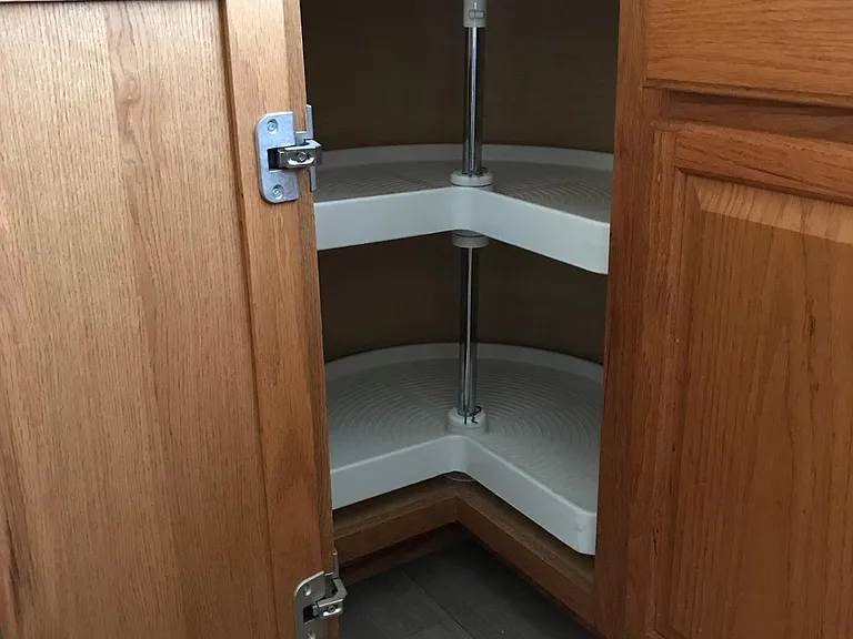 Corner rotating cabinets