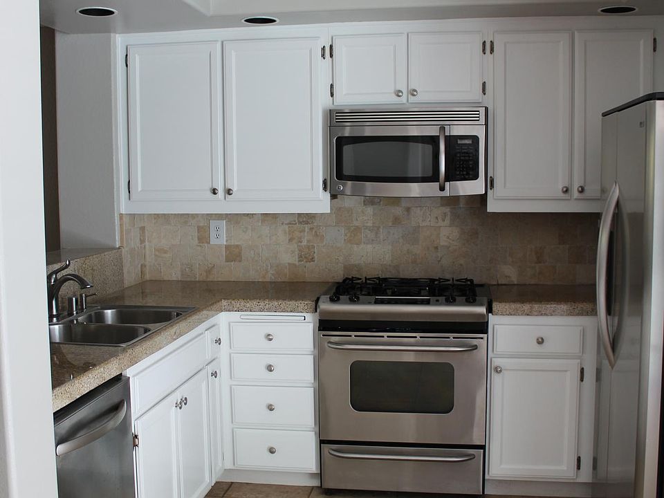 Kitchen with stainless steel appliances