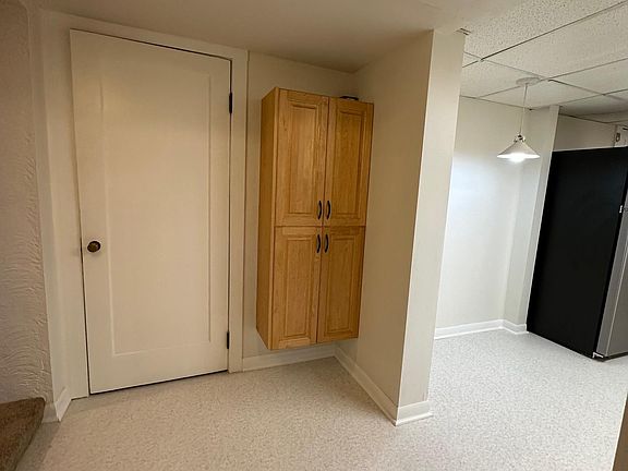 Entry. Kitchen to the Right. Pantry Cabinet & Large Closet straight ahead.