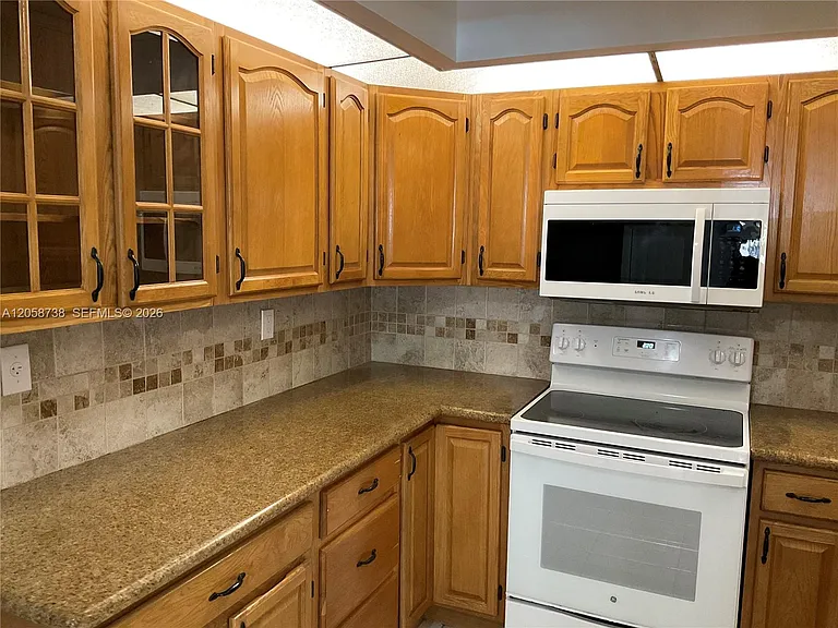 8860 SW 123rd Ct #K107 — Photo 1