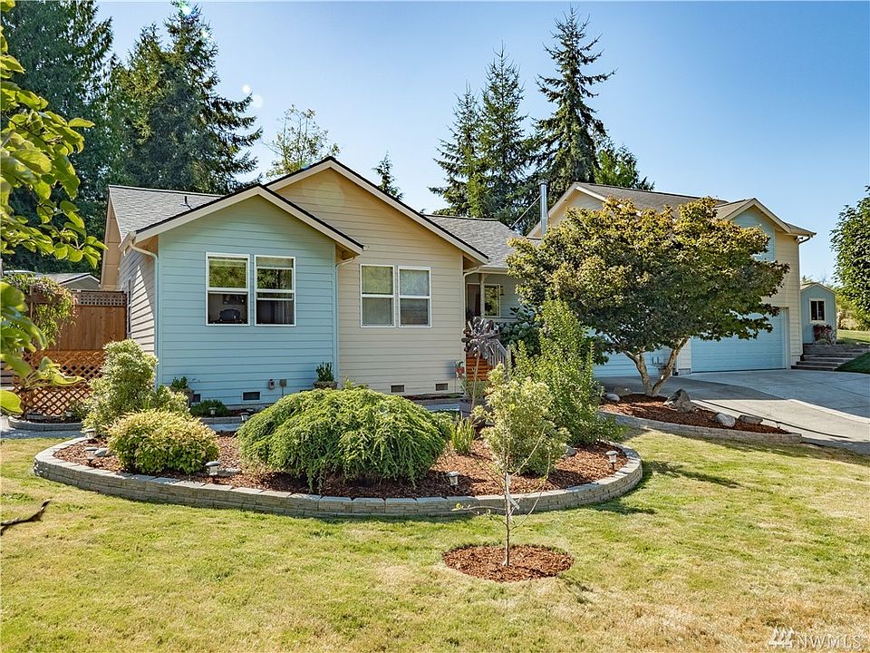 The exterior of this beautiful rambler was recently completely painted, it has a newer roof and gorgeous landscaping.