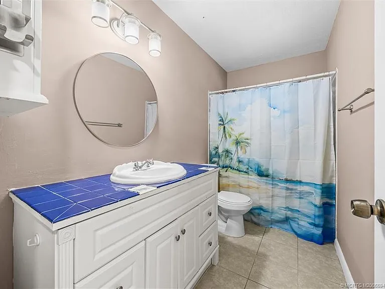 687 NE Maranta Terrado — Photo 21