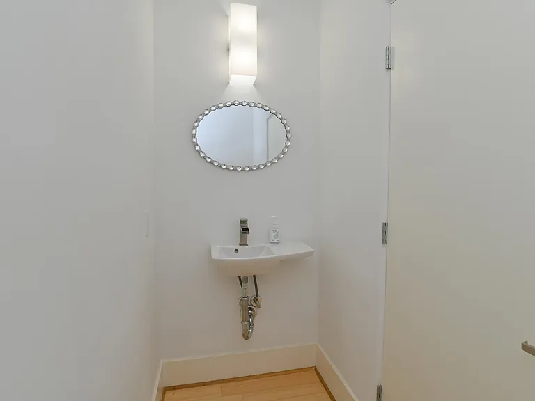 Half bath off living room.