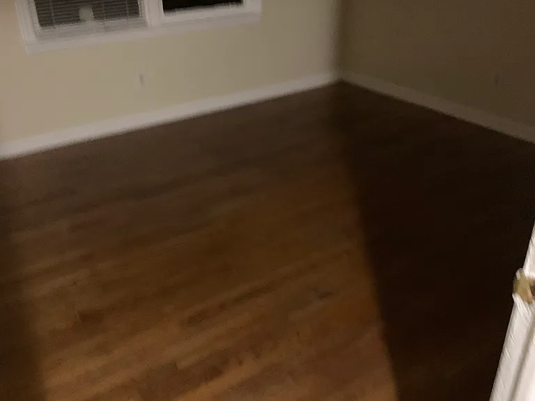 Bedroom with beautiful hardwood floors