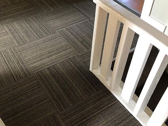 Top of the stairs. New carpet. Master bedroom on the right. Bathroom and kitchen on the left. Living room and other 2 bedrooms at the bottom of the picture.