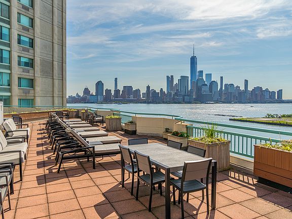Elevate your gatherings on a rooftop deck that offers stunning skyline vistas